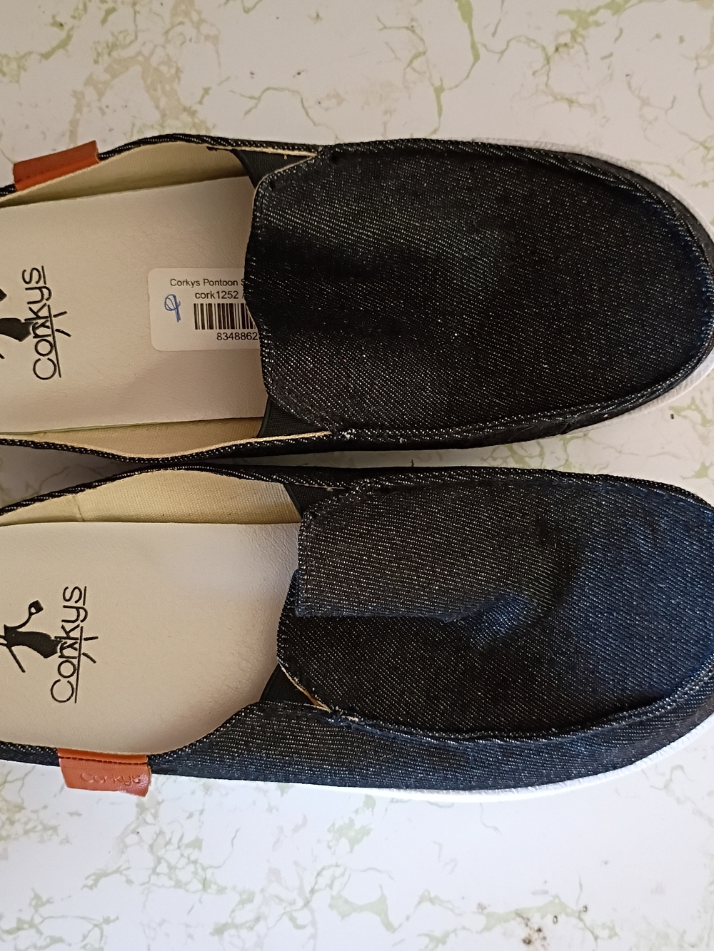 Corkys Men’s Black Denim Slip-On Loafers with Tan Tab